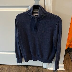 Two Tommy Hilfiger sweaters. Both men size medium. Light wear no stains.